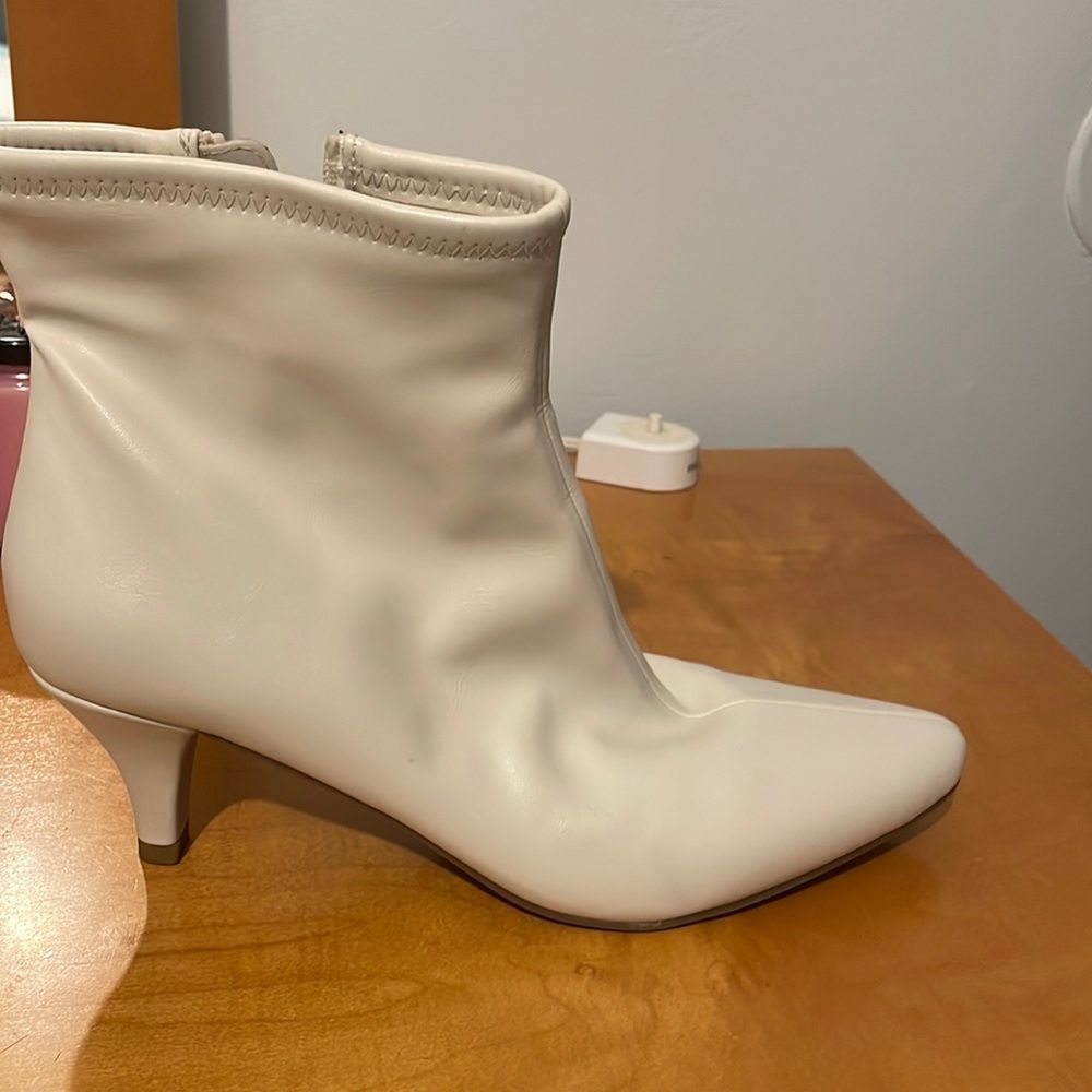 Winter white ankle booties. Two inch kitten heel very comfortable! Worn once.